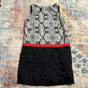 Black and White Sleeveless Dress with Red Accent